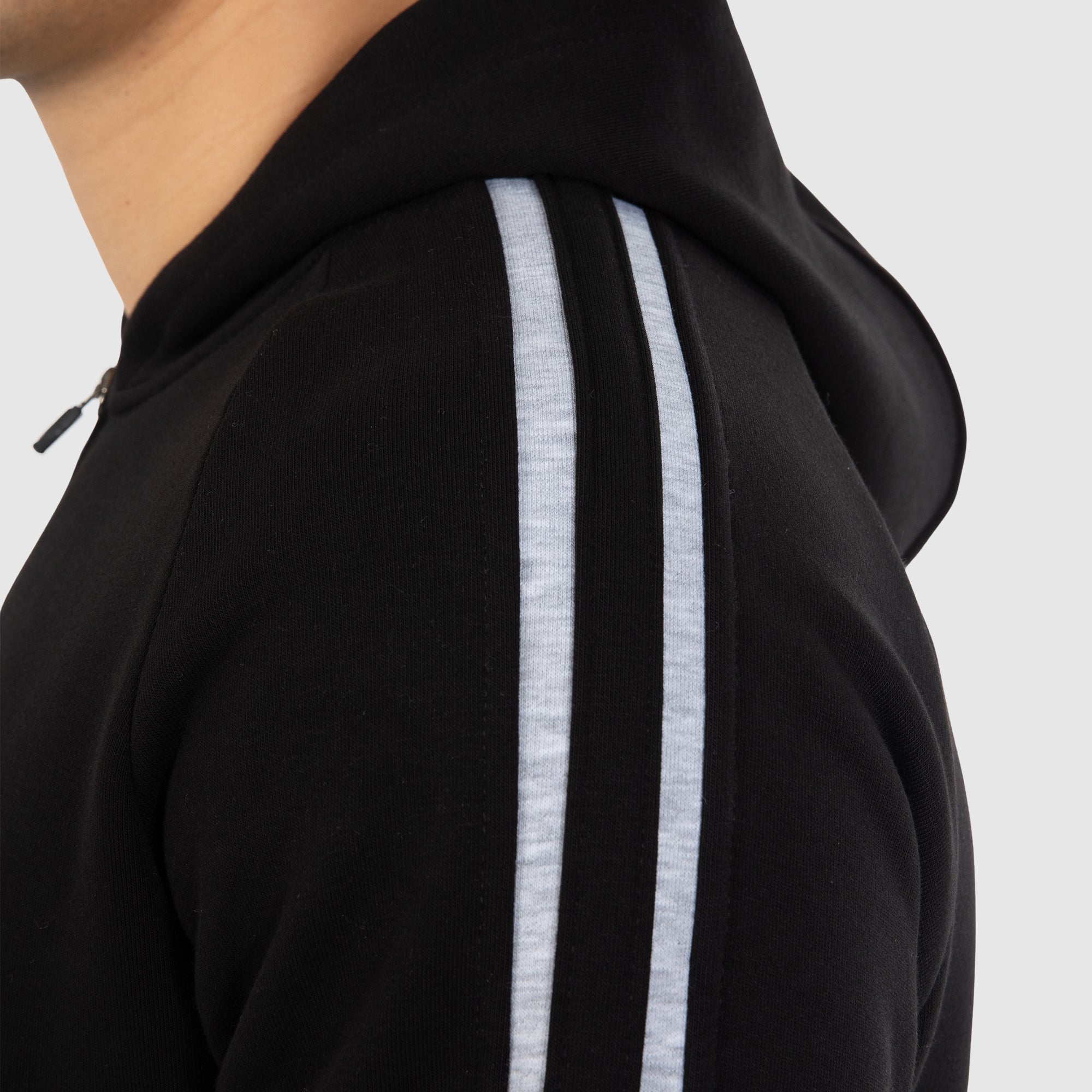 Black hoodie with white stripes on sleeves on sale